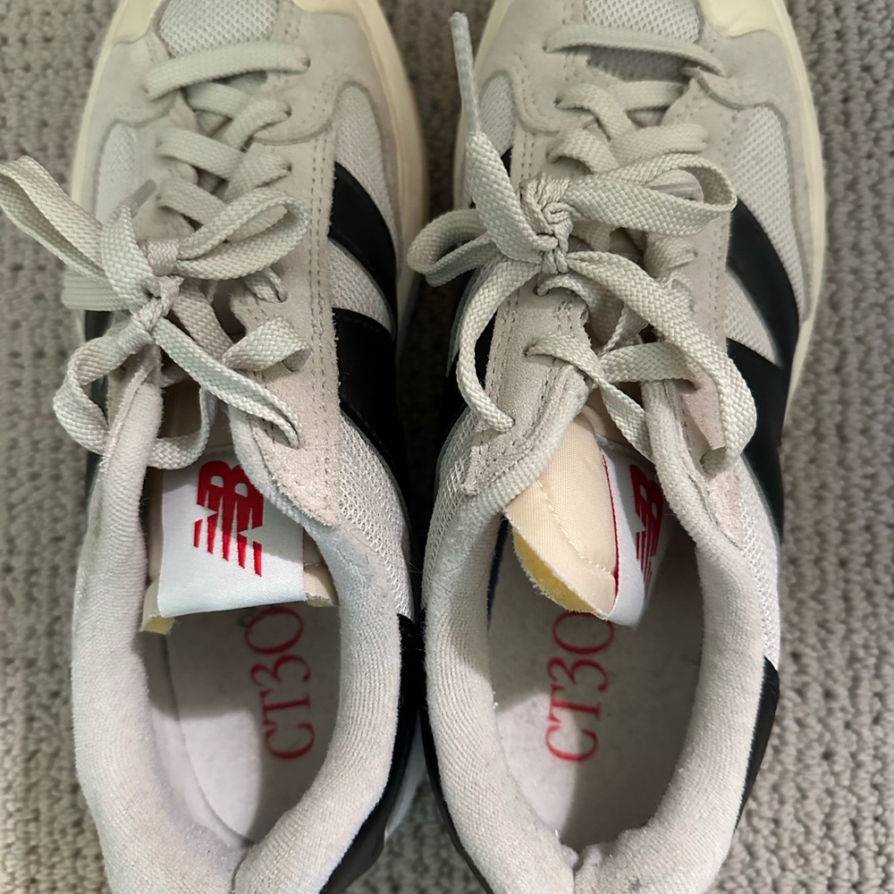 New Balance Cream and Black Sneakers